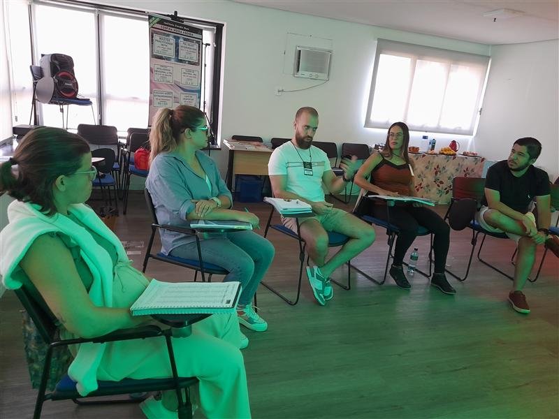 Turma em círculo durante a Formação Practitioner em PNL em São Paulo
